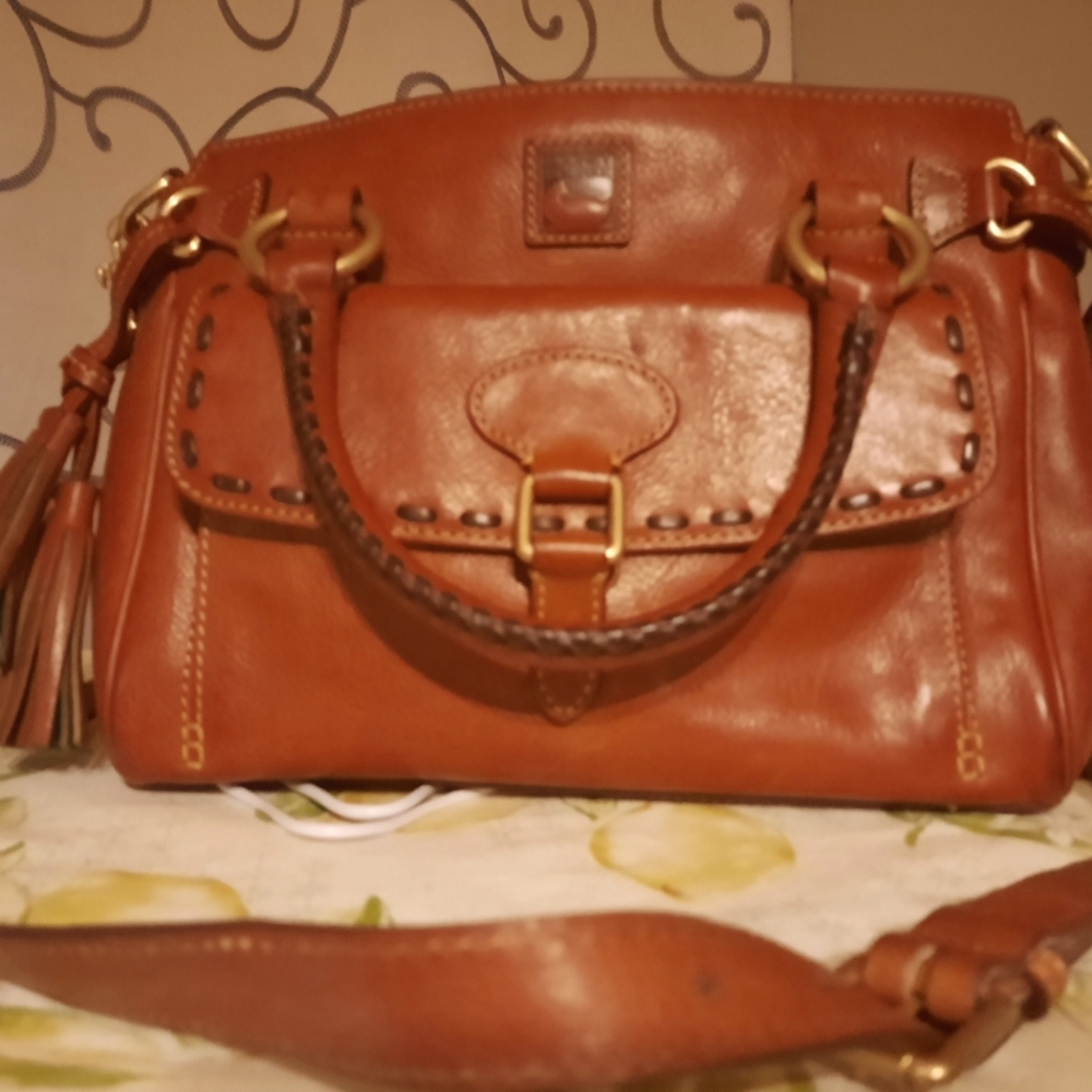 Authentic Dooney & Bourke bag Christmas is upon us this purchase is a steal.